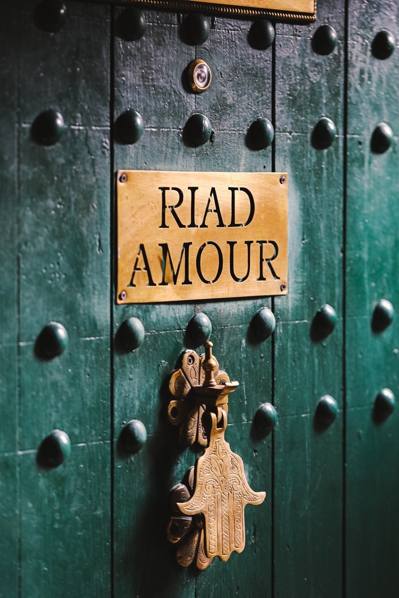 The green entrance door at Riad Amour